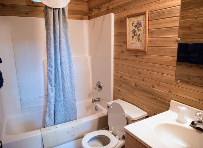 Bathroom with a standard tub/shower.