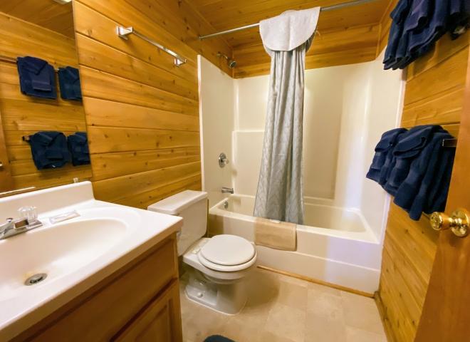 Master bathroom with a standard tub/shower.