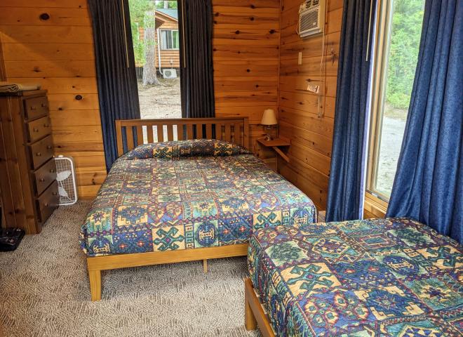 Bedroom with a queen and twin bed.