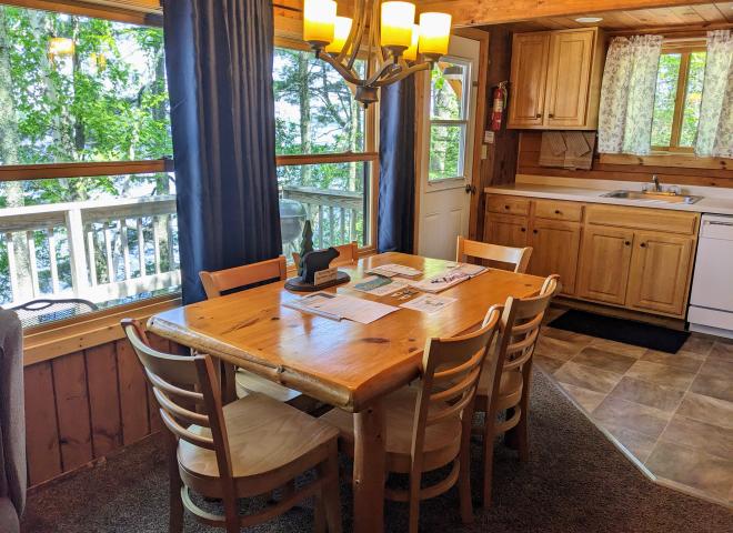 Dining room with seating for 6 and views of the lake.