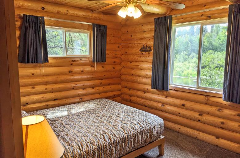Main floor bedroom with a queen bed.