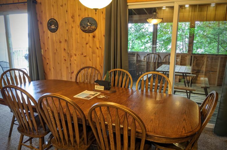 Dining Room with ample seating and access to the screen porch.