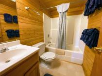 Master bathroom with a standard tub/shower.